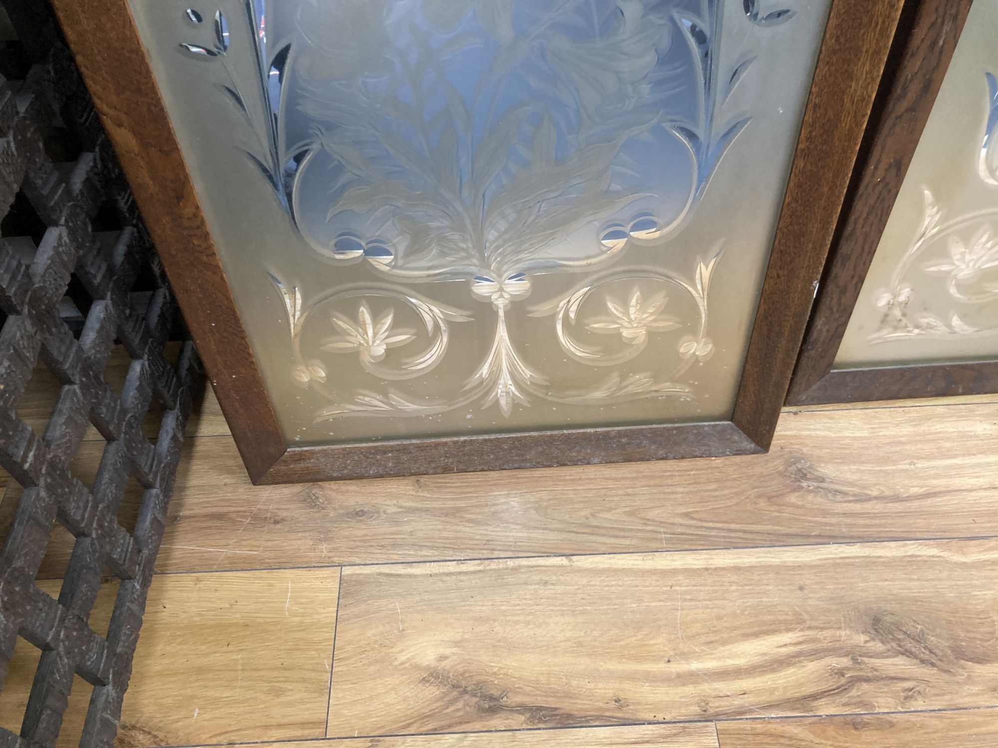 A pair of Victorian oak framed etched glass panels, width 55cm height 144cm